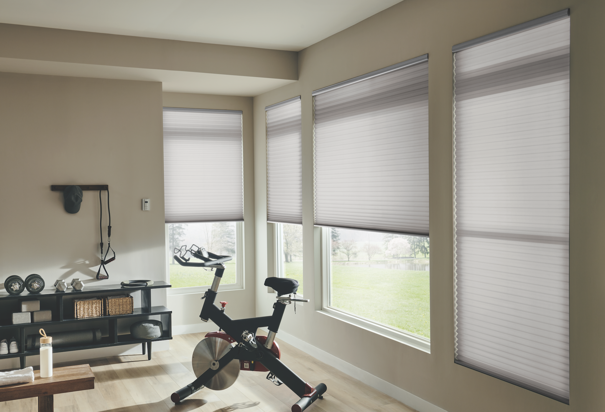 Light-filtering cellular shades in a home gym