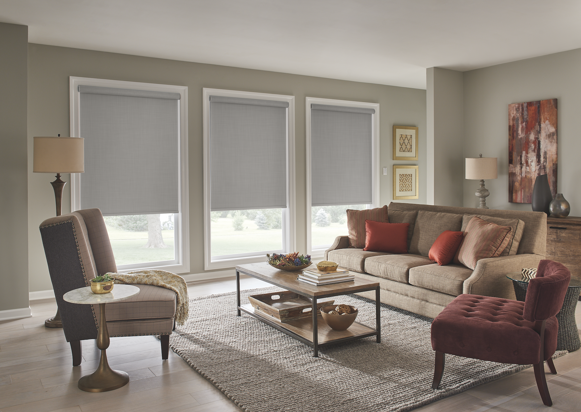 Gray roller shades in a living room