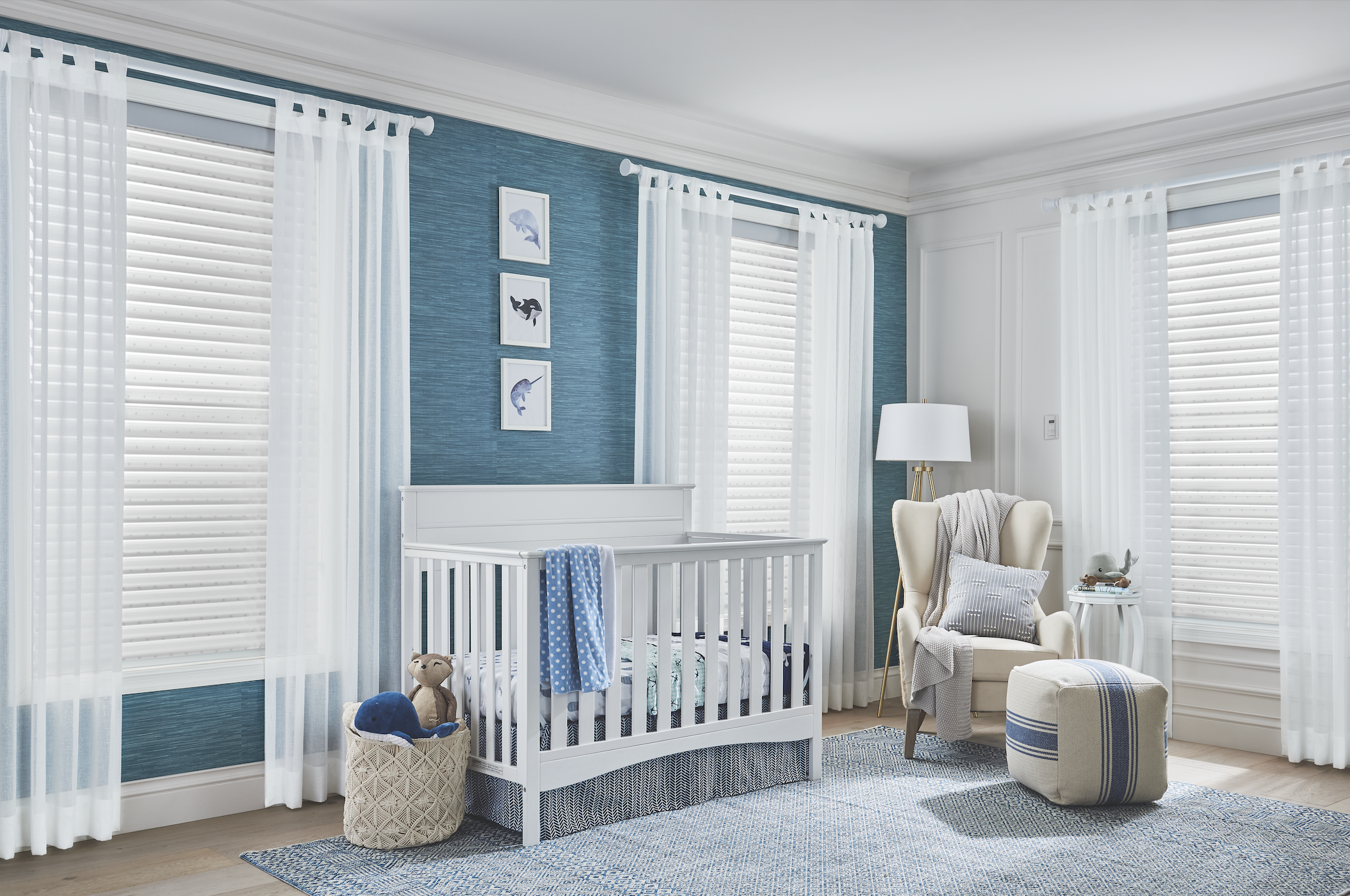 Sheer shades with drapery in a nursery
